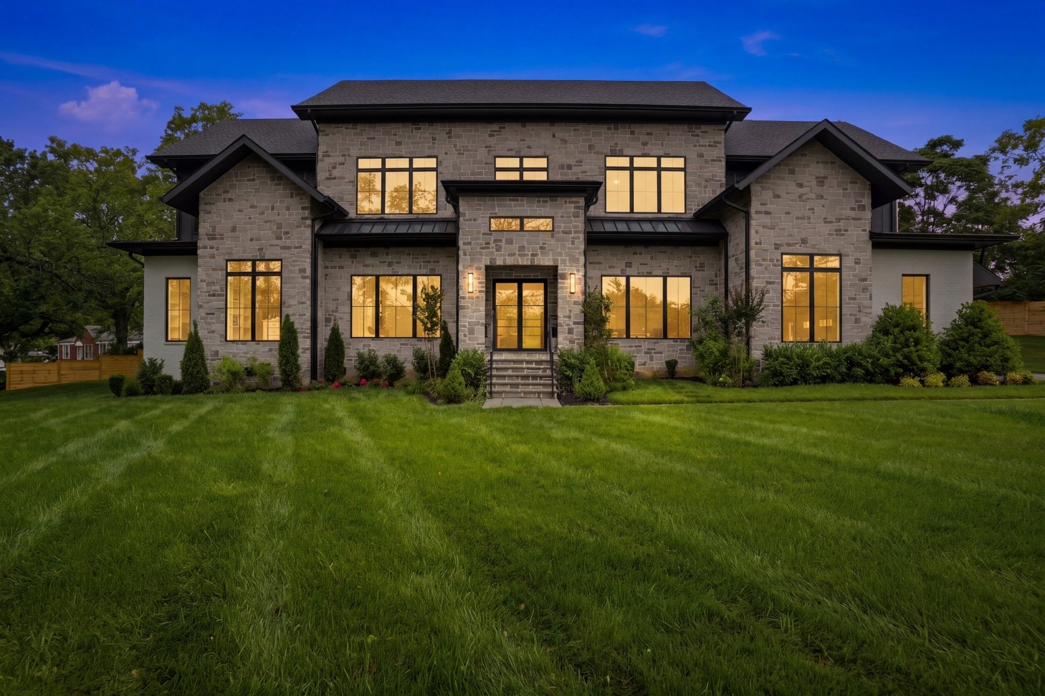 6612 Fleetwood Dr front exterior at dusk, Hillwood Nashville